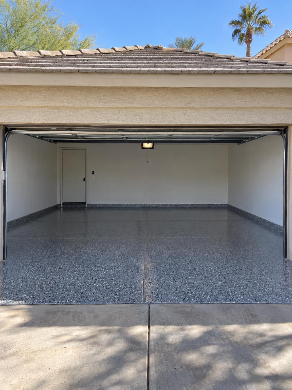 Glossy grey flake epoxy garage floor