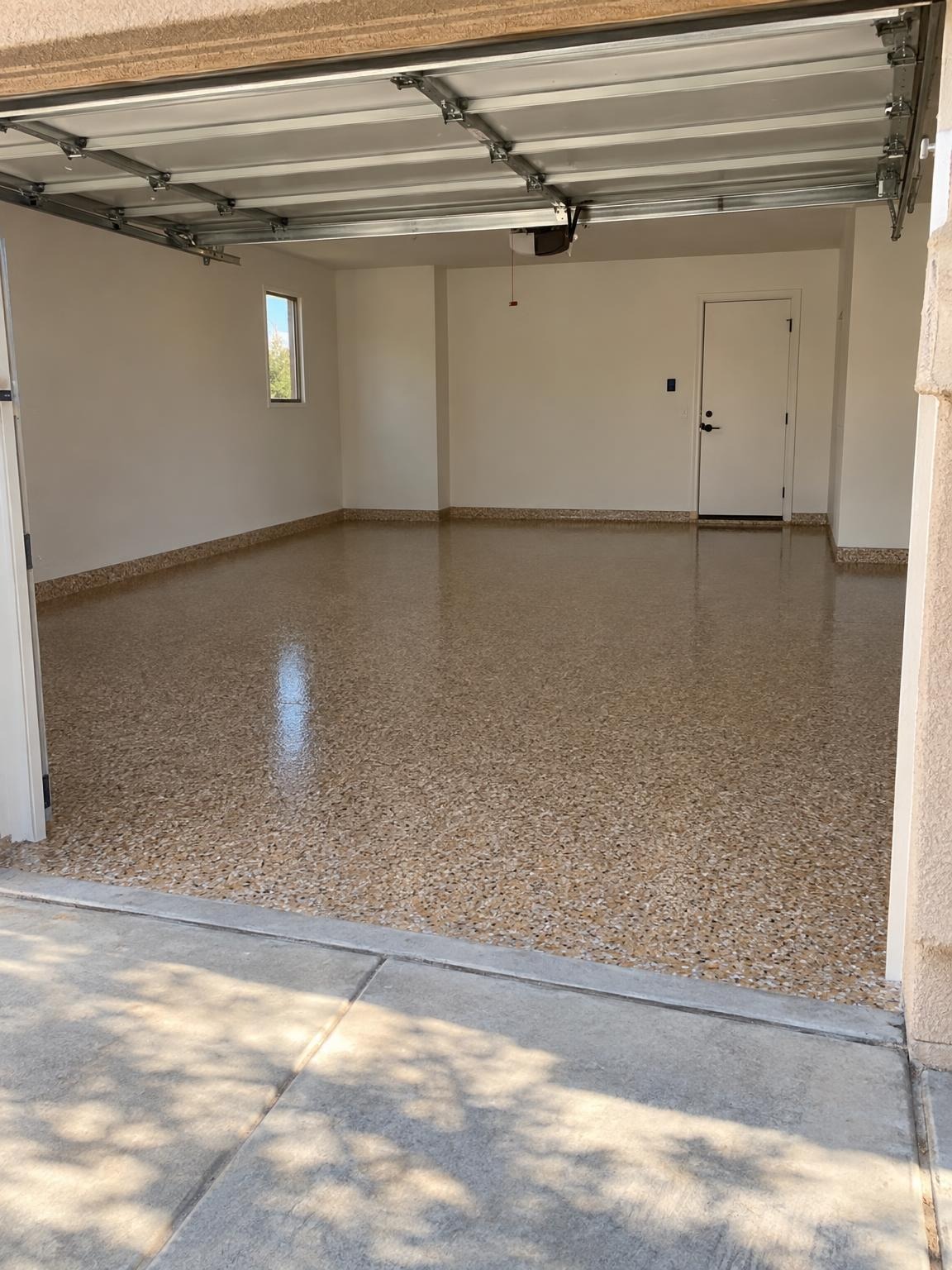 Tan flake epoxy garage floor
