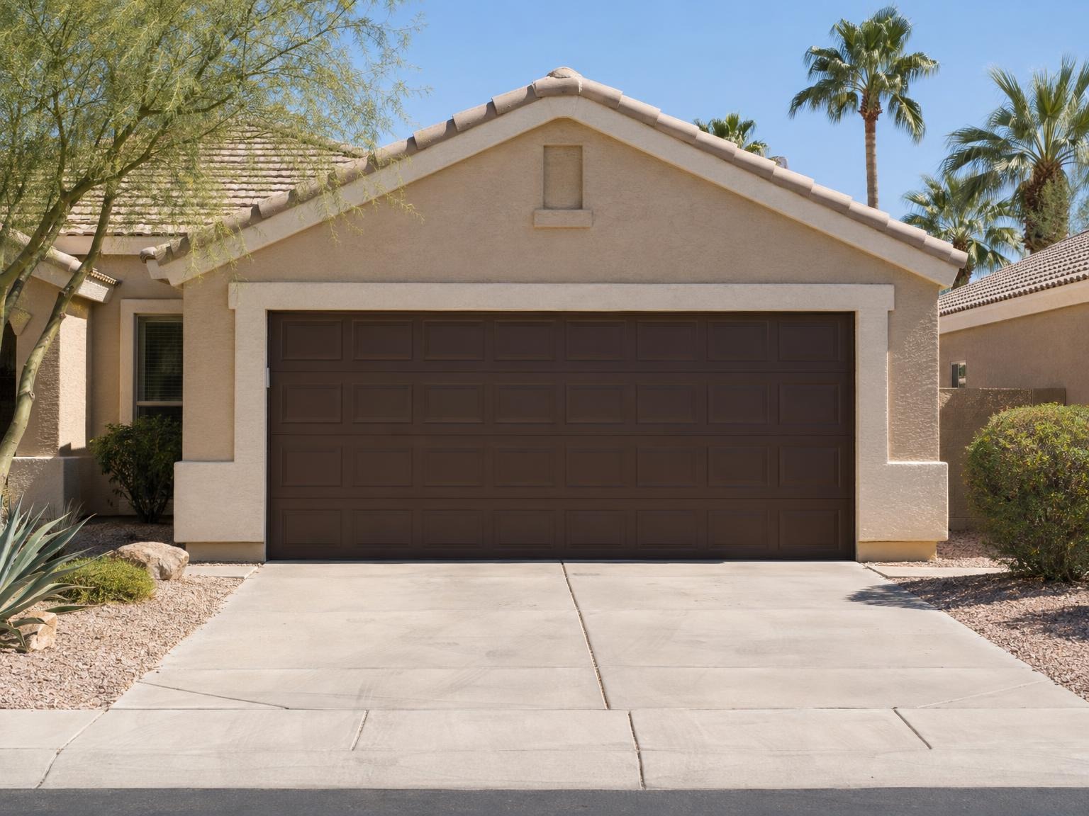 The same garage door painted deep brown